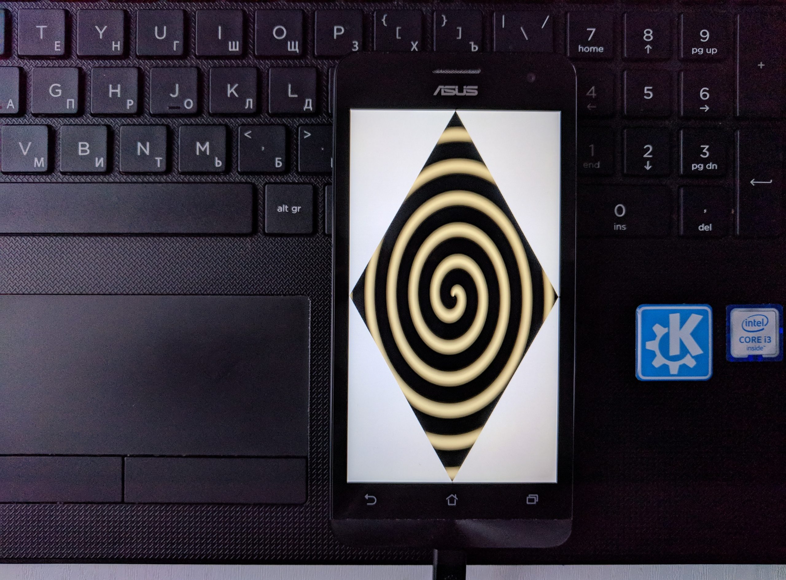 ASUS ZenFone 5 running a hardware-accelerated spiral demo with Halium