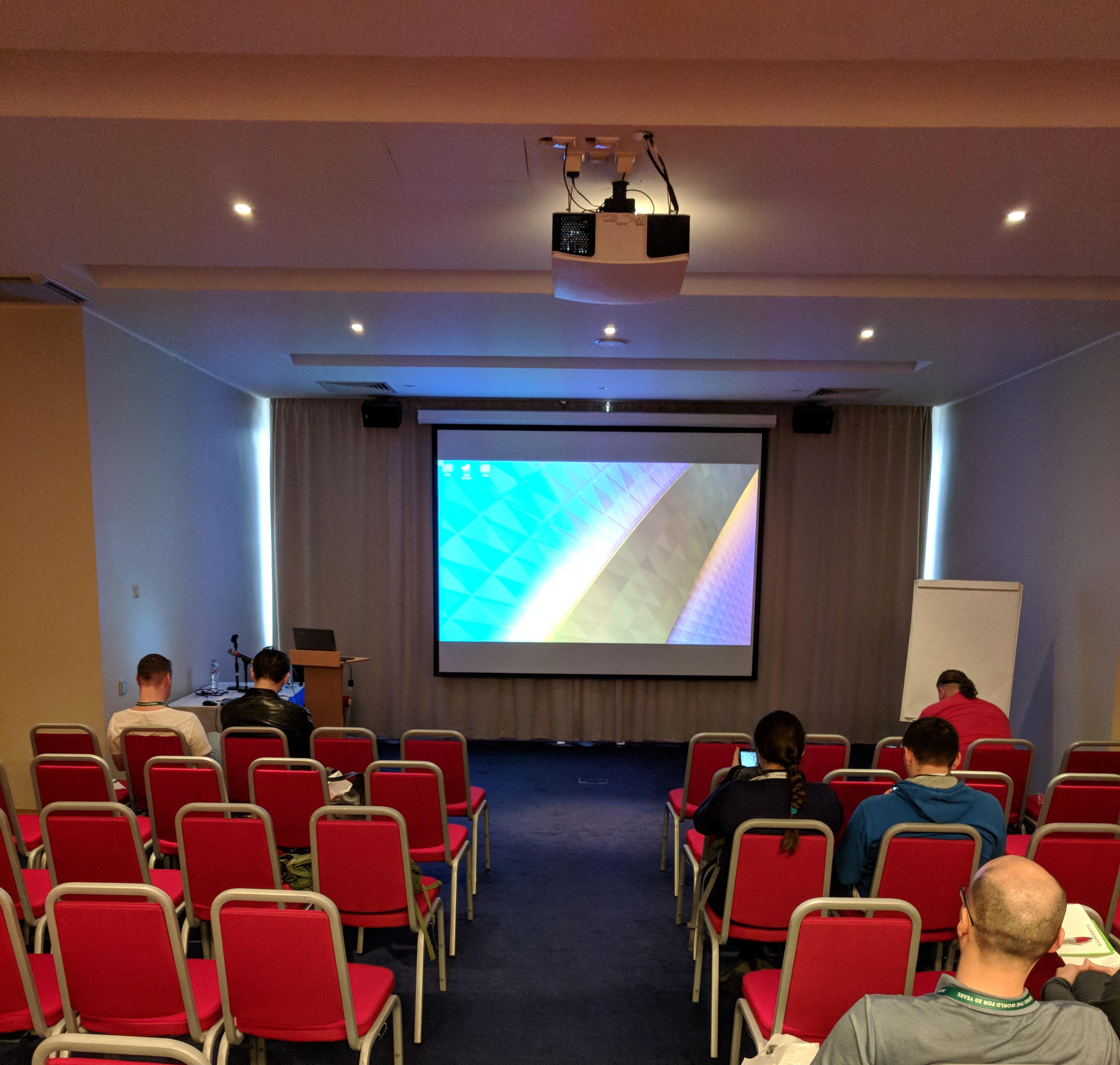 KDE Plasma displayed in a C++ Russia presentation room