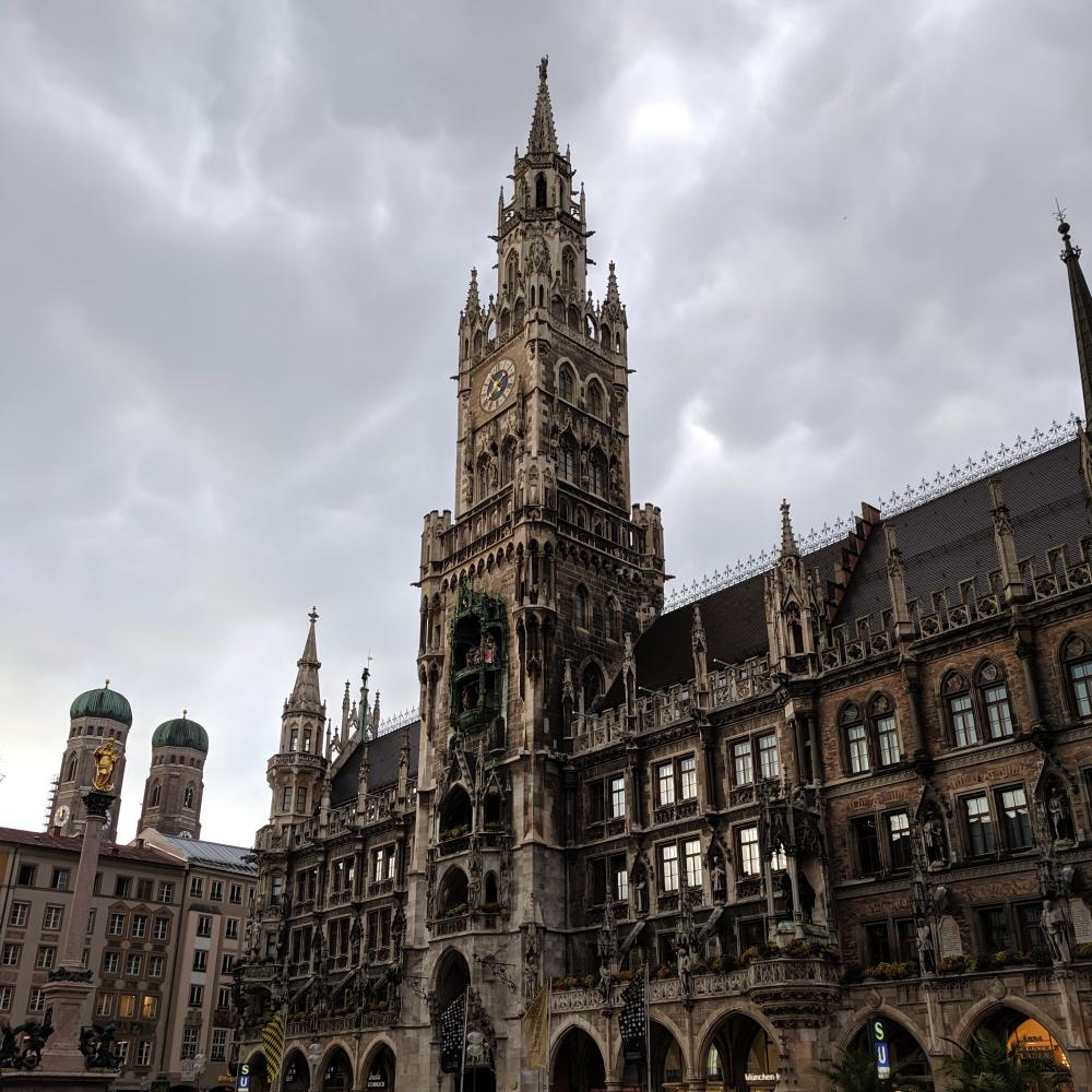 Munich New Town Hall and Frauenkirche under cloudy skies